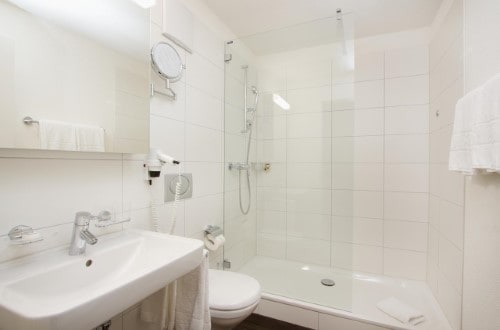 Ensuite bath at Central Sporthotel in Davos, Switzerland. Travel with World Lifetime Journeys