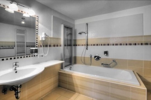 Ensuite bath at Garni Bracun Hotel in Corvara, Italy. Travel with World Lifetime Journeys