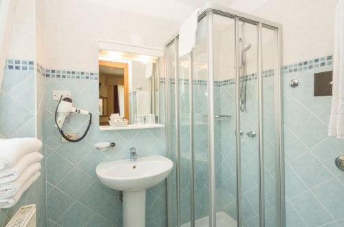 Ensuite bath at Hotel Bellavista in Arabba, Italy. Travel with World Lifetime Journey