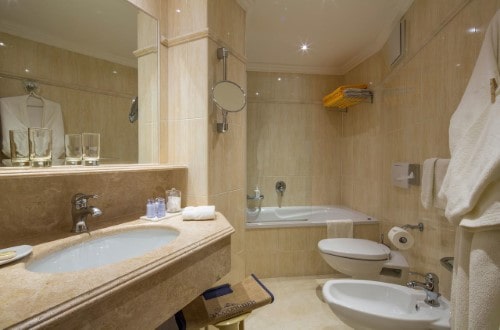 Ensuite bath at Hotel Sassongher in Corvara, Italy. Travel with World Lifetime Journeys