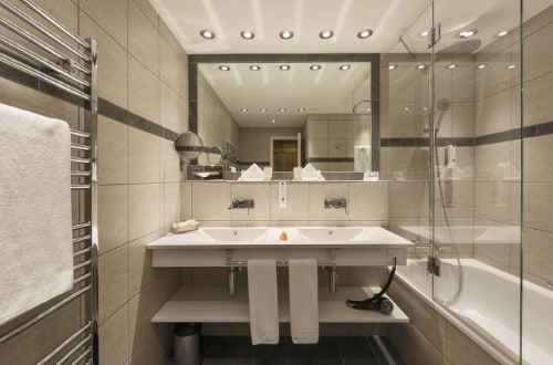 Ensuite bath at Hotel Sunstar Arosa, Switzerland. Travel with World Lifetime Journeys