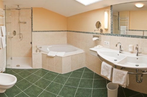 Ensuite bath at Hotel Tiefenbrunner in Kitzbühel, Austria. Travel with World Lifetime Journeys