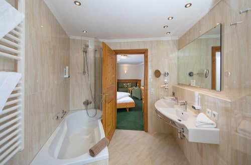 Ensuite bath at Hotel Zum Hirschen in Zell am See, Austria. Travel with World Lifetime Journeys