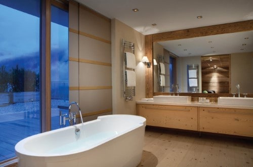 Ensuite bath at Kempinski Hotel Das Tirol in Kitzbühel, Austria. Travel with World Lifetime Journeys