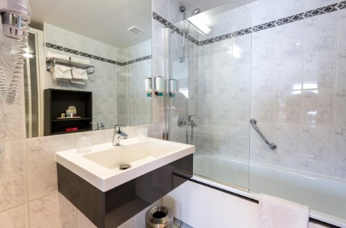 Ensuite bath at Thon Hotel Brussels City Centre in Brussels, Belgium. Travel with World Lifetime Journeys