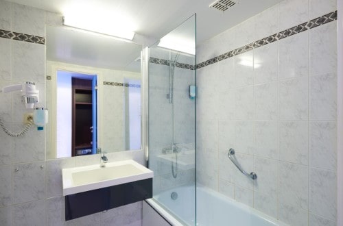 Ensuite bath at Thon Hotel Brussels City Centre in Brussels, Belgium. Travel with World Lifetime Journeys