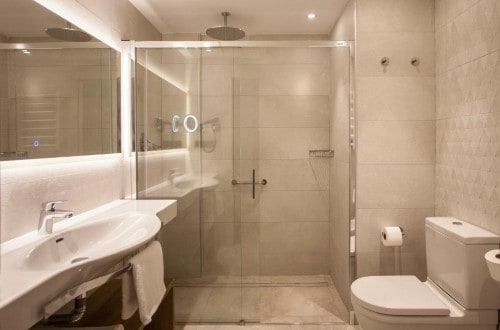 Ensuite bathroom at Hotel Presidente in Benidorm, Spain. Travel with World Lifetime Journeys