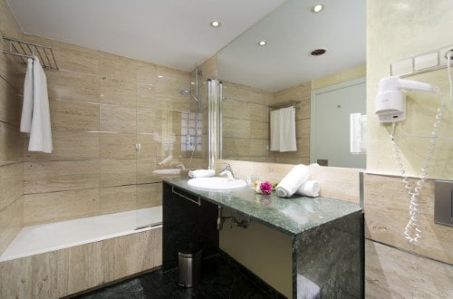 Ensuite bathroom at Hotel Roc Golf Trinidad in Almeria, Spain. Travel with World Lifetime Journeys