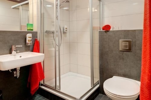 Ensuite bathroom at Meininger Hotel Downtown Sissi in Vienna, Austria. Travel with World Lifetime Journeys