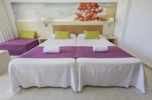 Family room at Azuline Hotel Coral Beach in Es Canar, Ibiza. Travel with World Lifetime Journeys