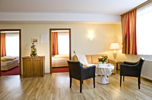 Family suite at Hotel Feinschmeck in Zell am See, Austria. Travel with World Lifetime Journeys