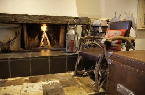 Fire place at Hotel Steffani in St. Moritz, Switzerland. Travel with World Lifetime Journeys