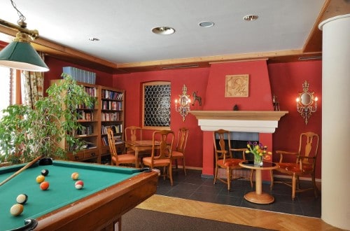 Games room at Silvretta Parkhotel in Klosters, Switzerland. Travel with World Lifetime Journeys