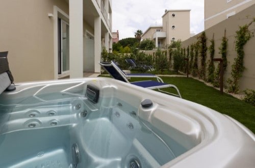 Garden jacuzzi at Hotel Nautilus in Cagliari, Italy. Travel with World Lifetime Journeys