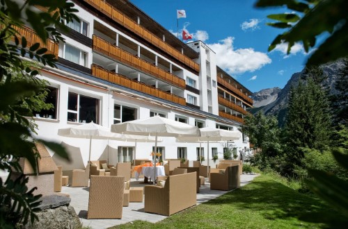 Garden view at Hotel Sunstar Arosa, Switzerland. Travel with World Lifetime Journeys