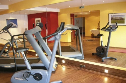 Gym room at Hotel Tiefenbrunner in Kitzbühel, Austria. Travel with World Lifetime Journeys