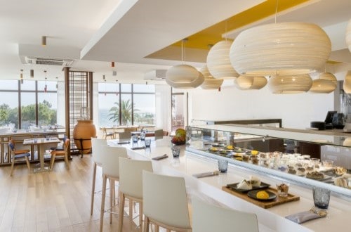 Have a meal at Club Med Da Balaia Resort, Albufeira, Portugal. Travel with World Lifetime Journeys