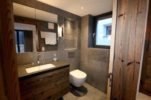 Heinrida ensuit bath at Allalin Apartments in Saas Fee, Switzerland. Travel with World Lifetime Journeys