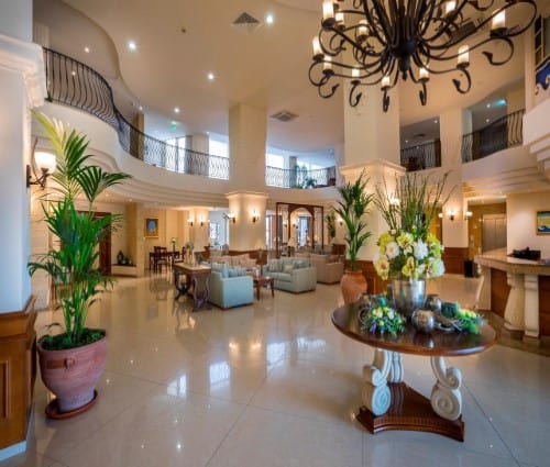 Hotel hall at Aquamare Beach Hotel in Paphos, Cyprus. Travel with World Lifetime Journeys