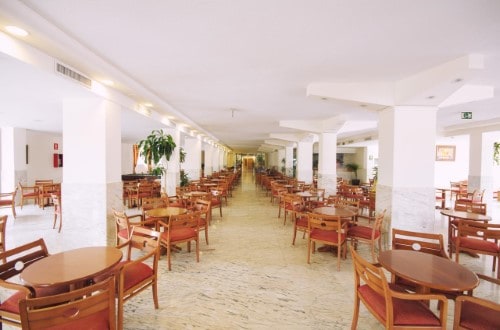 Hotel restaurant at Azuline Hotel Coral Beach in Es Canar, Ibiza. Travel with World Lifetime Journeys