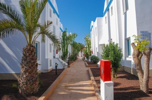 Hotel grounds at Arena Beach Apartments in Corralejo, Fuerteventura. Travel with World Lifetime Journeys