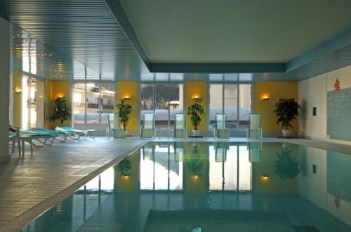 Indoor pool at Central Sporthotel in Davos, Switzerland. Travel with World Lifetime Journeys