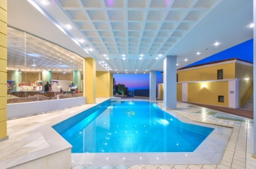 Indoor pool at Fodele Beach Water Park Resort in Crete, Greece. Travel with World Lifetime Journeys