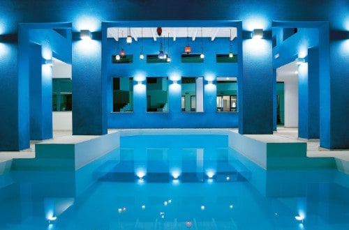 Indoor pool at Grecotel Plaza Spa Apartments in Rethymno, Crete. Travel with World Lifetime Journeys