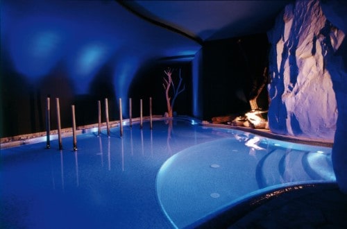 Indoor pool at Hotel Adler Dolomiti in Ortisei, Italy. Travel with World Lifetime Journeys