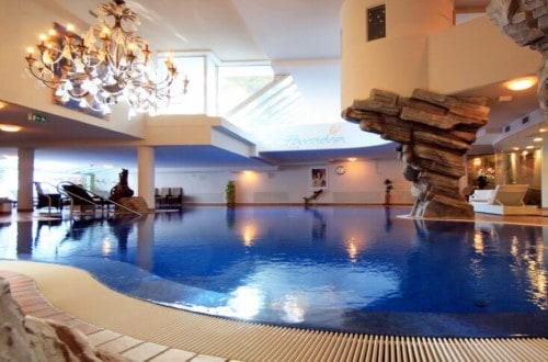 Indoor pool at Hotel Ferienart Resort & Spa in Saas Fee, Switzerland. Travel with World Lifetime Journeys