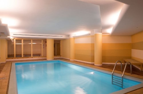 Indoor pool at Hotel Portavescovo in Arabba, Italy. Travel with World Lifetime Journeys