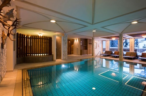 Indoor pool at Hotel Sassongher in Corvara, Italy. Travel with World Lifetime Journeys