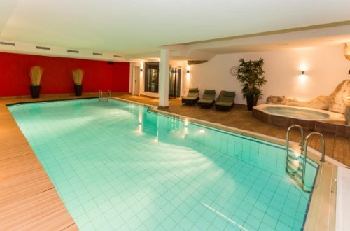 Indoor pool at Hotel Schweizerhof Gourmet and Spa in Saas Fee, Switzerland. Travel with World Lifetime Journeys