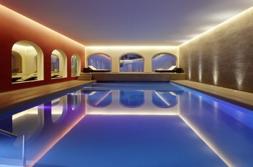 Indoor pool at Hotel Steffani in St. Moritz, Switzerland. Travel with World Lifetime Journeys