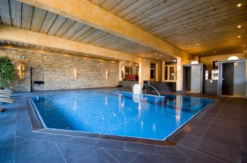 Indoor pool at Hotel Tiefenbrunner in Kitzbühel, Austria. Travel with World Lifetime Journeys