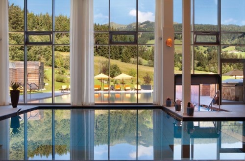 Indoor pool at Kempinski Hotel Das Tirol in Kitzbühel, Austria. Travel with World Lifetime Journeys