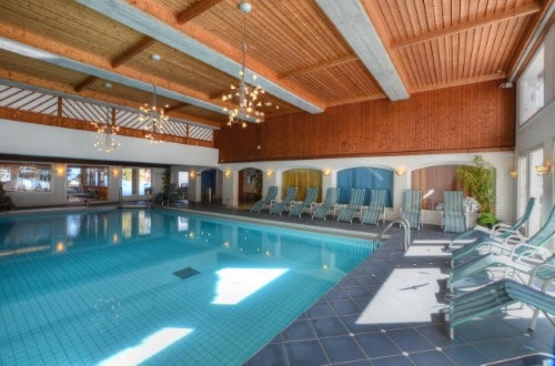 Indoor pool at Silvretta Parkhotel in Klosters, Switzerland. Travel with World Lifetime Journeys