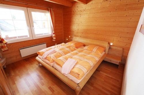 Inge bedroom at Allalin Apartments in Saas Fee, Switzerland. Travel with World Lifetime Journeys