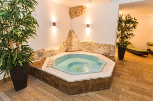 Jacuzzi at Hotel Schweizerhof Gourmet and Spa in Saas Fee, Switzerland. Travel with World Lifetime Journeys