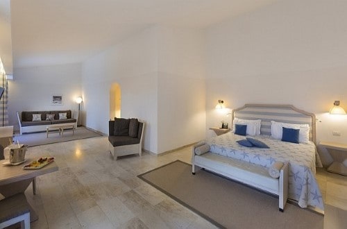 Junior suite at Grand Baia Resort in San Teodoro, Sardinia. Travel with World Lifetime Journeys