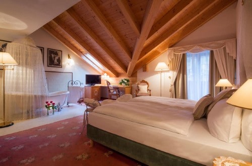 Junior suite at Hotel Tablé in Corvara, Italy. Travel with World Lifetime Journeys