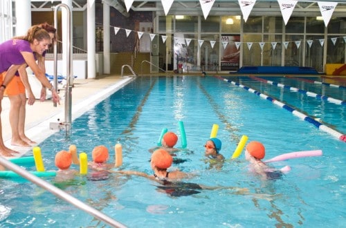 Kids swimming lessons at Hotel Dynastic in Benidorm, Spain. Travel with World Lifetime Journeys