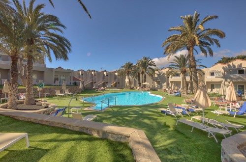 Sun lounges at The Koala Garden Suites in Maspalomas, Gran Canaria. Travel with World Lifetime Journeys