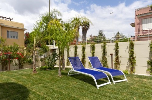 Lovely garden at Hotel Nautilus in Cagliari, Italy. Travel with World Lifetime Journeys