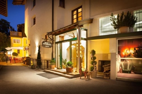 Main entrance at Hotel Zum Hirschen in Zell am See, Austria. Travel with World Lifetime Journeys