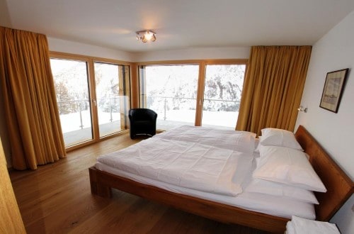 Marion bedroom at Allalin Apartments in Saas Fee, Switzerland. Travel with World Lifetime Journeys