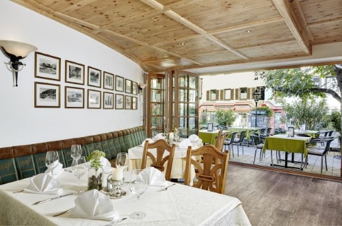 Open terrace restaurant at Romantik Hotel in Zell am See, Austria. Travel with World Lifetime Journeys