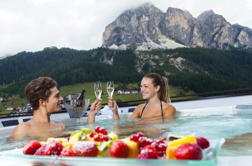 Outdoor pool at Hotel Col Alto in Corvara, Italy. Travel with World Lifetime Journeys