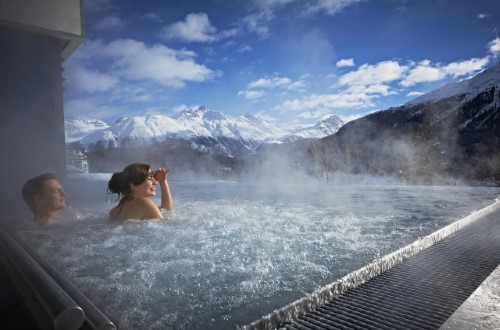 Outdoor pool at Hotel Kulm in St. Moritz, Switzerland. Travel with World Lifetime Journeys