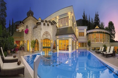 Outdoor pool at Salzburger Hof in Zell am See, Austria. Travel with World Lifetime Journeys